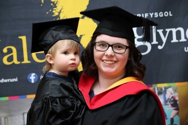 Maddy and her daughter at her graduation ceremony
