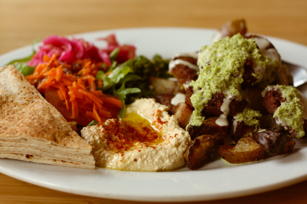 A vegan feat of falafel and flatbreads. Credit: https://www.flickr.com/photos/sweetonveg/